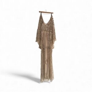 Glamorous Beige Maxi Dress with Intricate Detailing